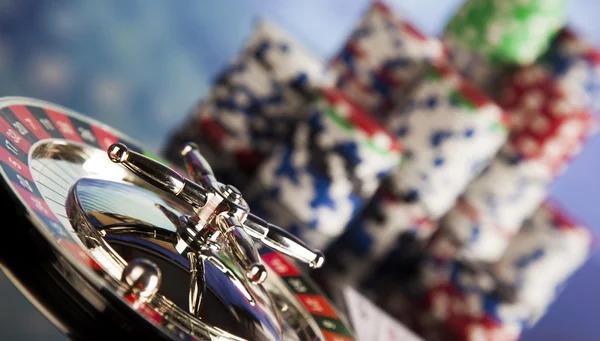 Live dealer studio with blackjack and roulette tables