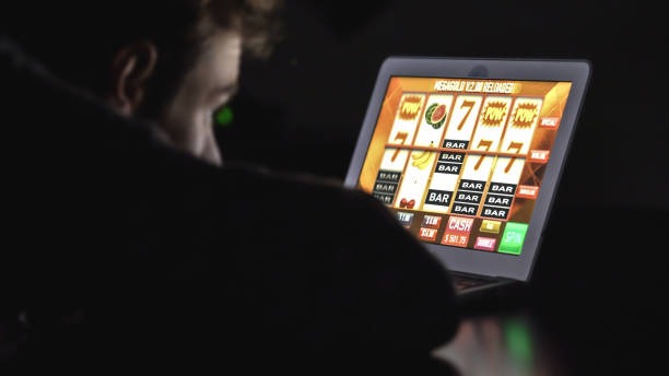 Close-up of live dealer controlling Number Table device